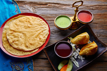 Samosas with Papadam red green sauces