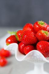 Organic fresh Strawberry. Red strawberry and blossom. Strawberry Juice. Loosely laid strawberries in different positions.