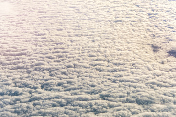 White clouds from above out of airplane