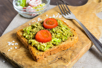 Avocado toast with whole wheat bread and vegetable salad