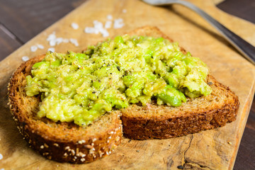 Avocado toast with whole wheat bread and pepper and salt