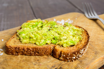 Wholegrain bread with avocado, pepper and salt