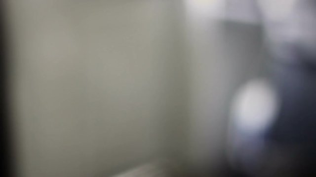 Man opens doorknob and leaves house during the day