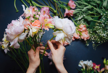 Flowers on black background. Decoration of different flowers. Mixed flowers. Fresh flowers.