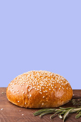 Close-up of burger bun with sesame seeds