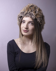 Caucasian, black T-shirt girl portrait with hat