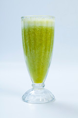 green vegetable smoothie on white backgroun. Celery smoothies