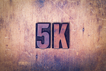 5K Theme Letterpress Word on Wood Background