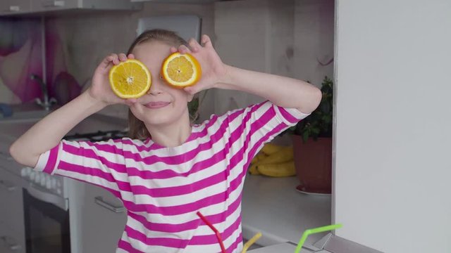 Child and oranges. Healthy Eating