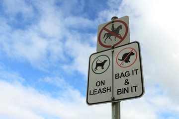 Dogs On Leash and Bag It And Bin It signs
