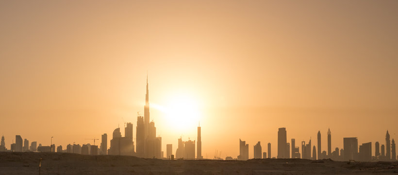 Panoramic view of Dubai downtown city at sunset