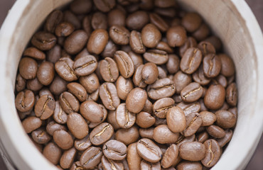 Roasted coffee beans in wooden box