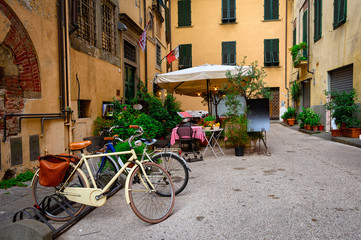 Fototapeta na wymiar Old cozy street in Lucca, Italy