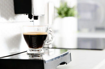 Professional home coffee maker in modern kitchen