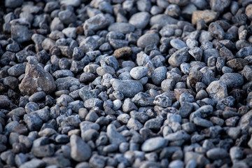 Crushed stone on the road as a background