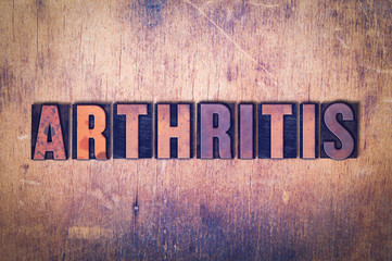 Arthritis Theme Letterpress Word on Wood Background
