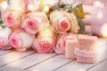 Spa still life with handmade soaps and roses