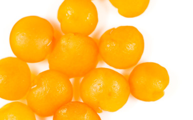 Red lentils on a white background