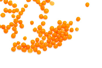 Red lentils on a white background