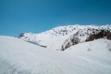 Fototapeta na wymiar Tateyama Kurobe Alpine Route the snow mountains wall