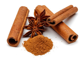 Cinnamon sticks and powder with star anise