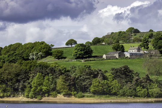 Farm and farmland at Bradfield, Sheffield, Yorkshire under cloudy skies