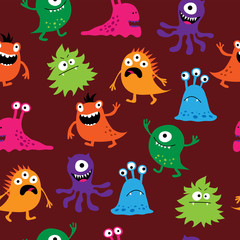 Seamless background with cute cheerful colorful monsters