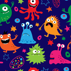 Seamless pattern with cute cheerful multi-colored monsters