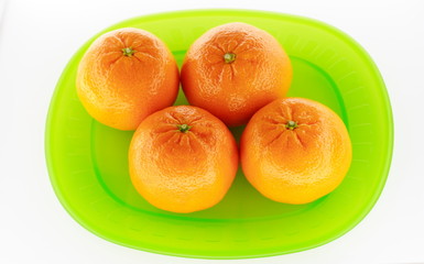 Healthy food series with tangerines on light background