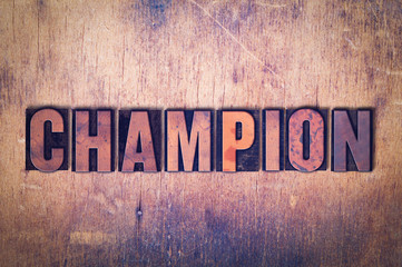 Champion Theme Letterpress Word on Wood Background