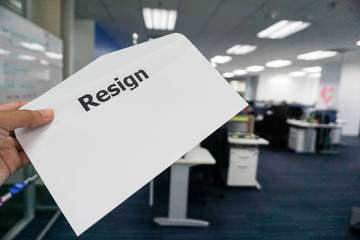 concept of business people submit resignation letter in office