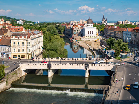 Oradea city center. Bridge over Crisul Repede river and Sion Synagogue
