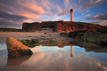 Amazing sunset over Lossiemouth lighthouse (Scotland UK) © inakibo