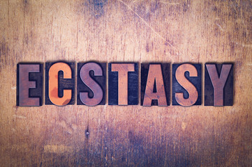 Ecstasy Theme Letterpress Word on Wood Background