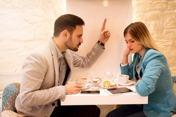 Businesspeople In A Cafe
