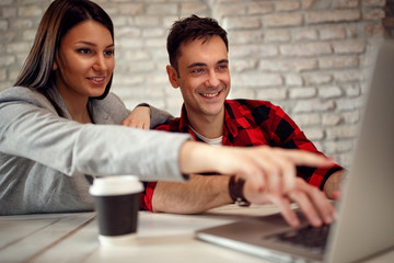 happy creative couple designers working .