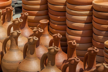 Fototapeta na wymiar Traditional Georgian clay jugs for sale in the village of Shrosha, Georgia