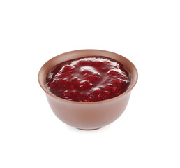 Bowl of delicious berry sauce isolated on white