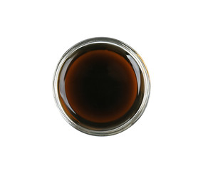 Bowl of delicious soy sauce isolated on white