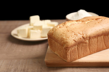 Delicious butter cake on table in kitchen