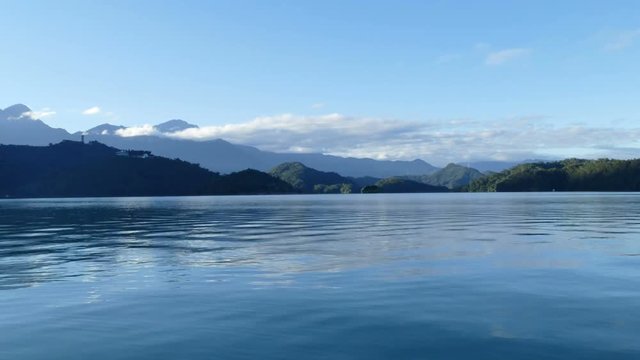 Clouds over the mountains near the Sun Moon Lake in time lapse