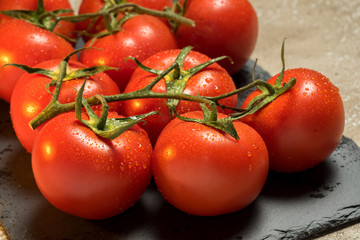 bunch of red ripe wet tomatoes