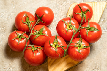 bunch of red ripe wet tomatoes