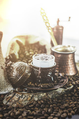 Turkish Coffee cup and saucer on a wooden table