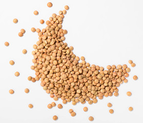 uncooked lentils on white, top view