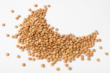 uncooked lentils on white, (large depth of field, taken with tilt shift lens)