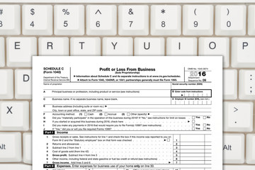 Naklejka na ściany i meble A US Federal tax Schedule C for 1040 income tax form