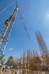 Fototapeta premium Building crane at construction site