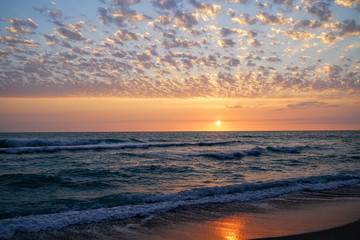 An incredible sunset over the Gulf of Mexico seen from a beach in southwest Florida.