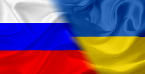 Fototapeta premium Flag of Russia and Ukraine, with waving fabric texture